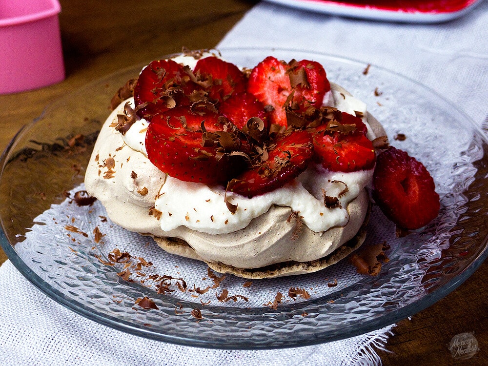 Chocolate Pavlova Topped with Strawberries and Whipped Cream