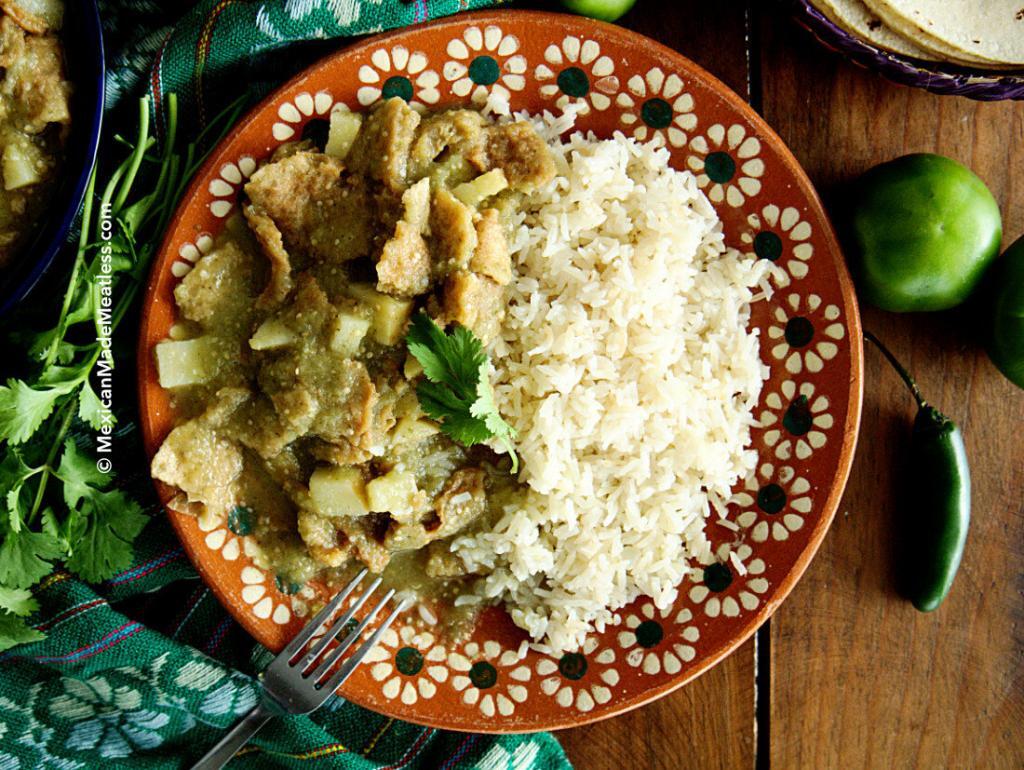 Vegan Chicharron in salsa verde served with Mexican white rice.