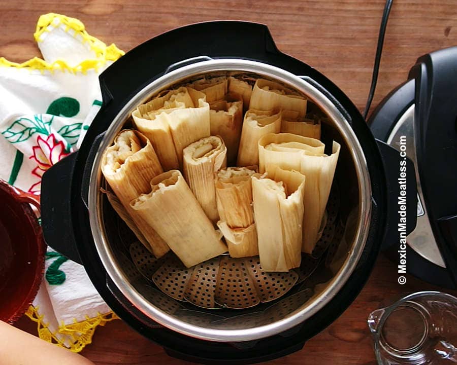 Steaming tamales in an Instant Pot pressure cooker.