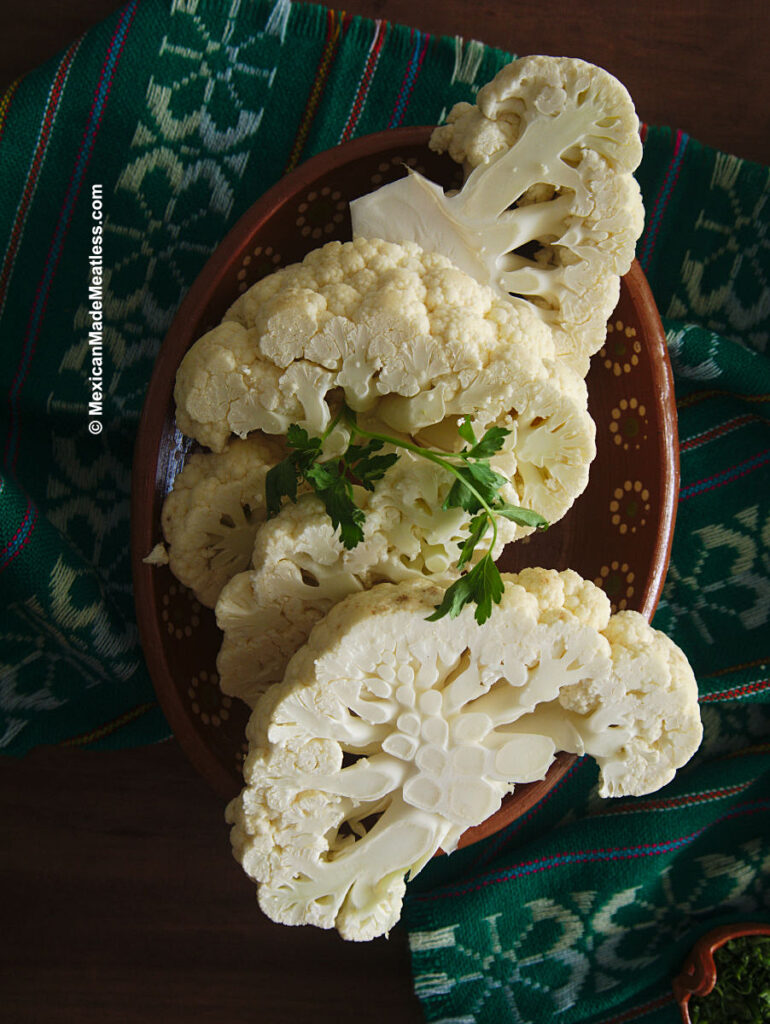 Cauliflower fillets on a plate ready to make a Mexican fish dish.