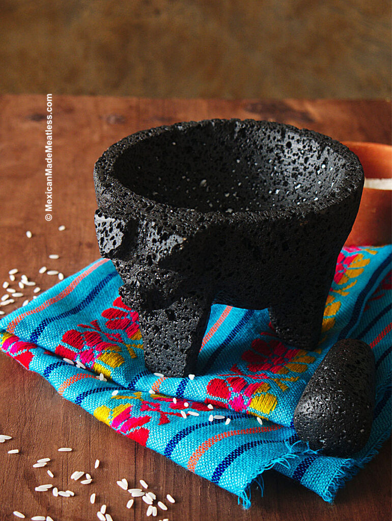 A volcanic stone molcajete that has been cured.
