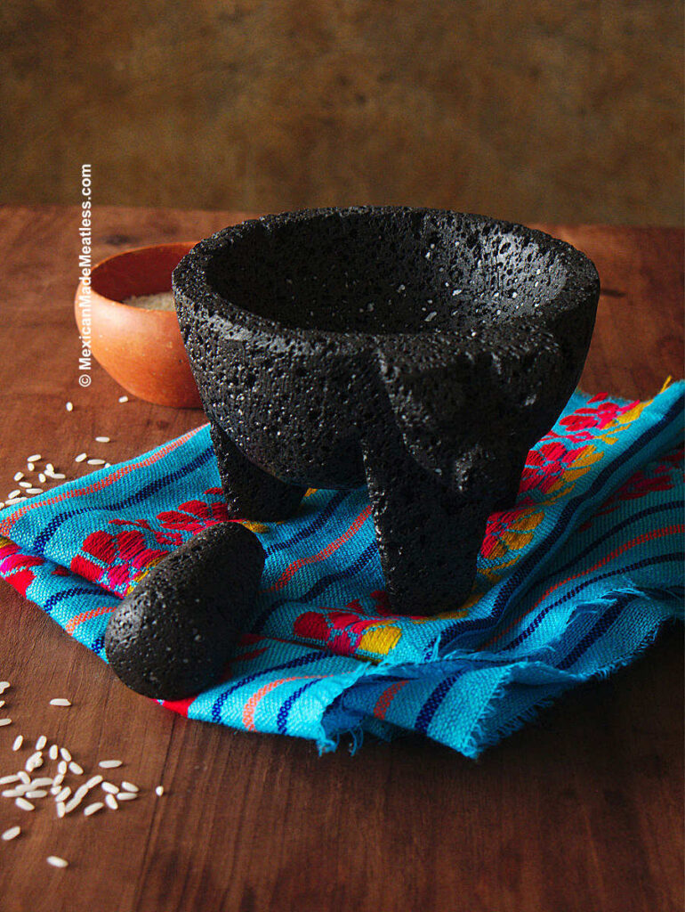 A volcanic stone molcajete that has been cured.