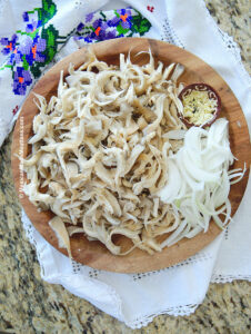 Shredded oyster mushrooms to make vegan tamales.