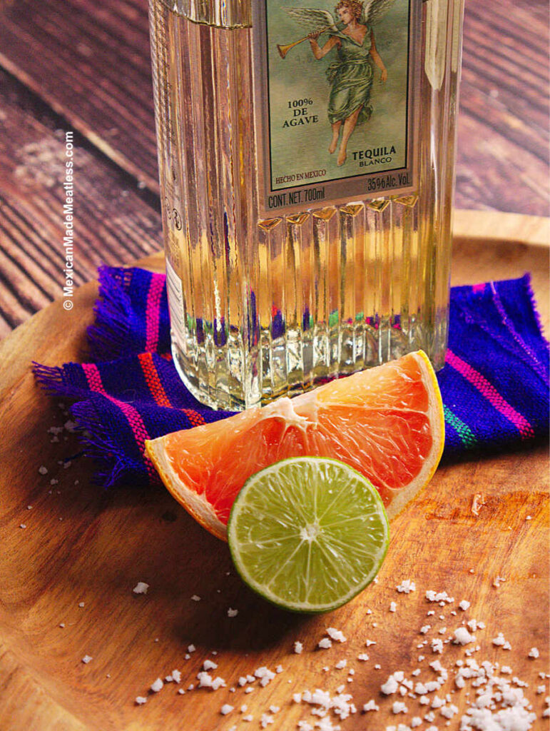 Tequila blanco, grapefruit and lime for making paloma cocktails.