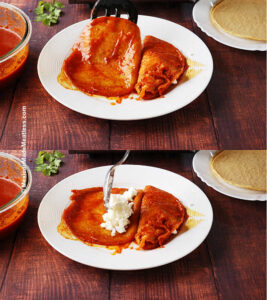Tortillas covered in red enchilada sauce on a white plate being filled with crumbled cheese to make enchiladas michoacanas.