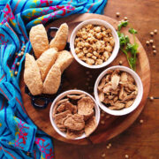 Four small bowls filled with different types of TVP or vegetarian soy meat.