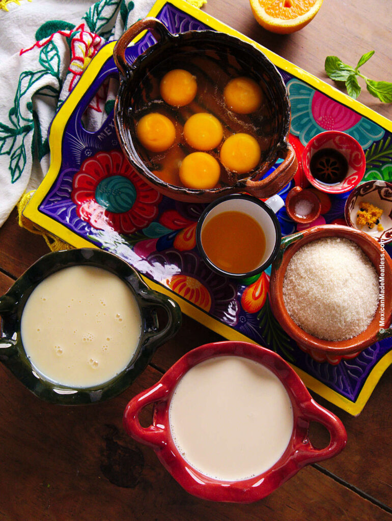 Ingredients for making Mexican La Lechera flan: eggs, sugar, evaporated milk, sweetened condensed milk, sugar, vanilla, orange zest.