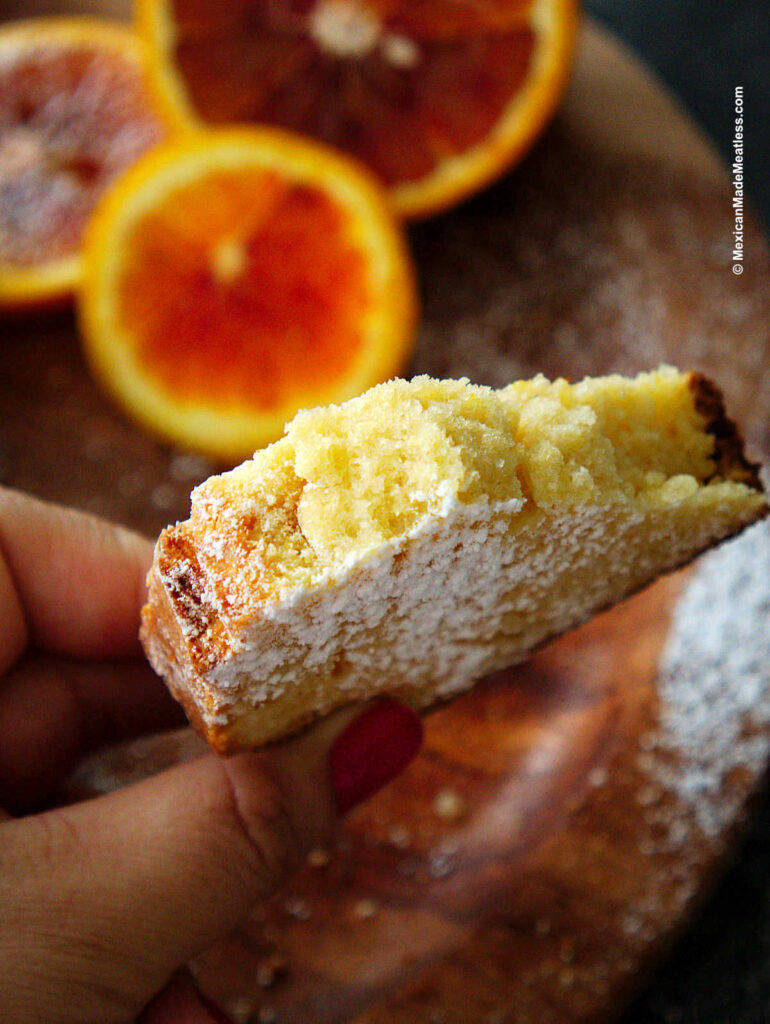 Up-close view of a slice of Mexican nata pound cake showing how light and airy the cake is.
