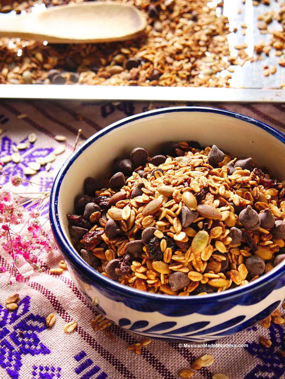 Small Mexican blue and white bowl filled with Mexican style granola.