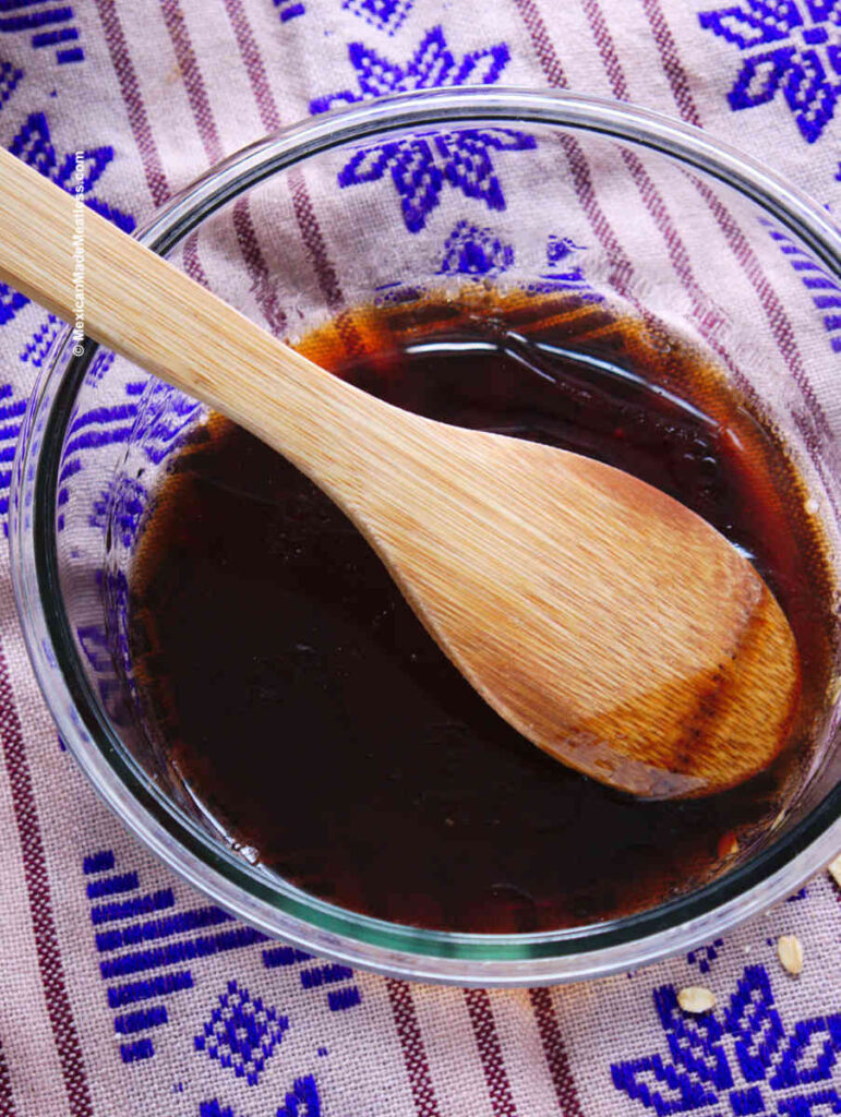 Making the piloncillo syrup in a small glass bowl. 