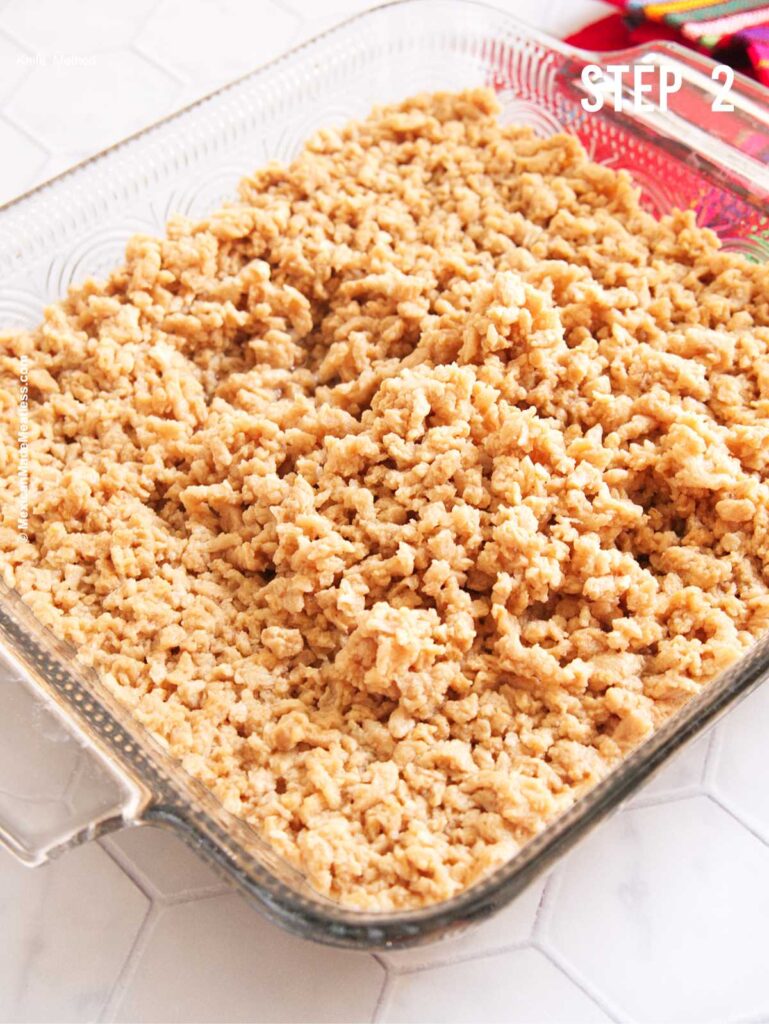 A glass baking dish filled with rehydrated soy crumbles.